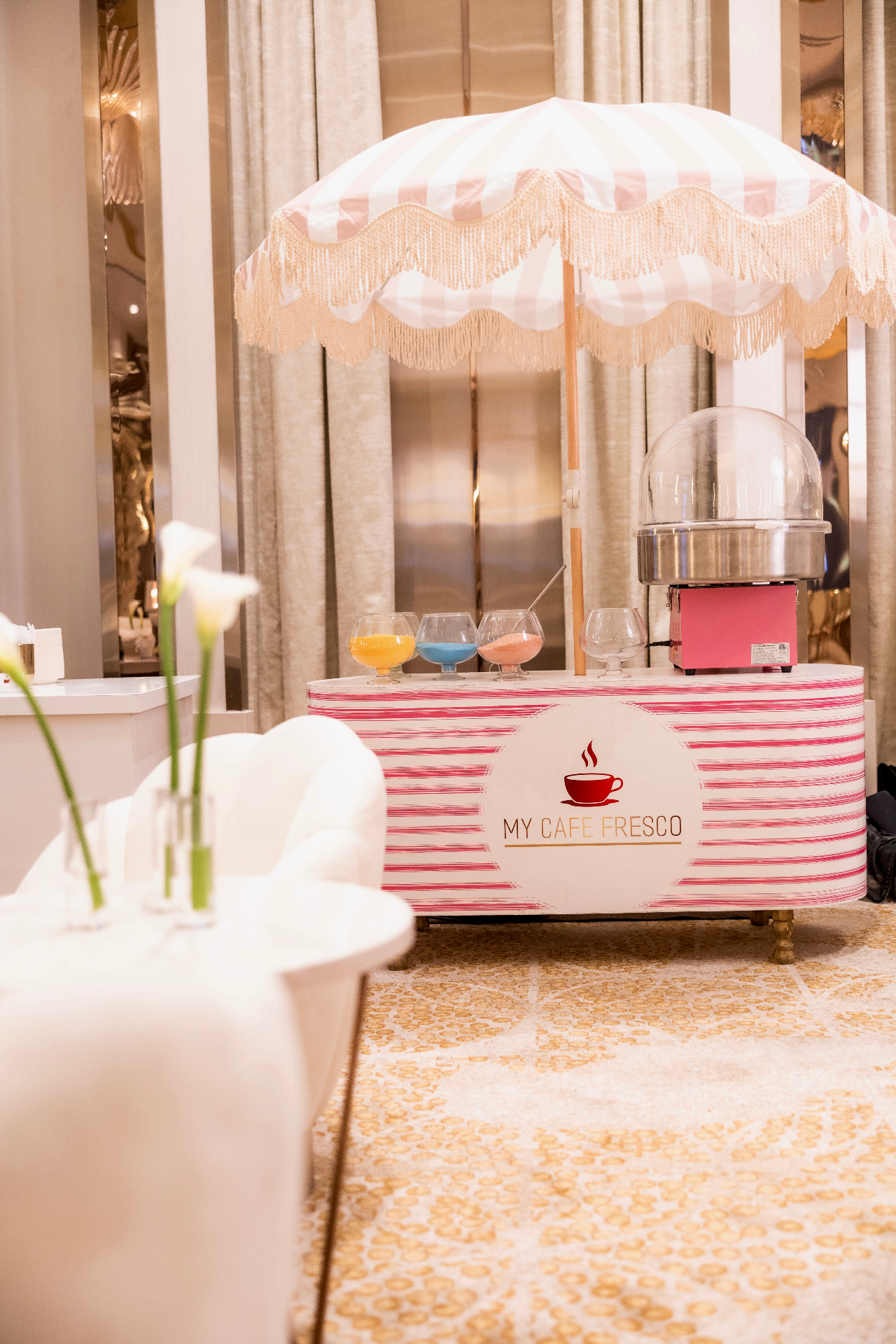Elegant My Cafe Fresco popcorn cart at a luxury hotel event