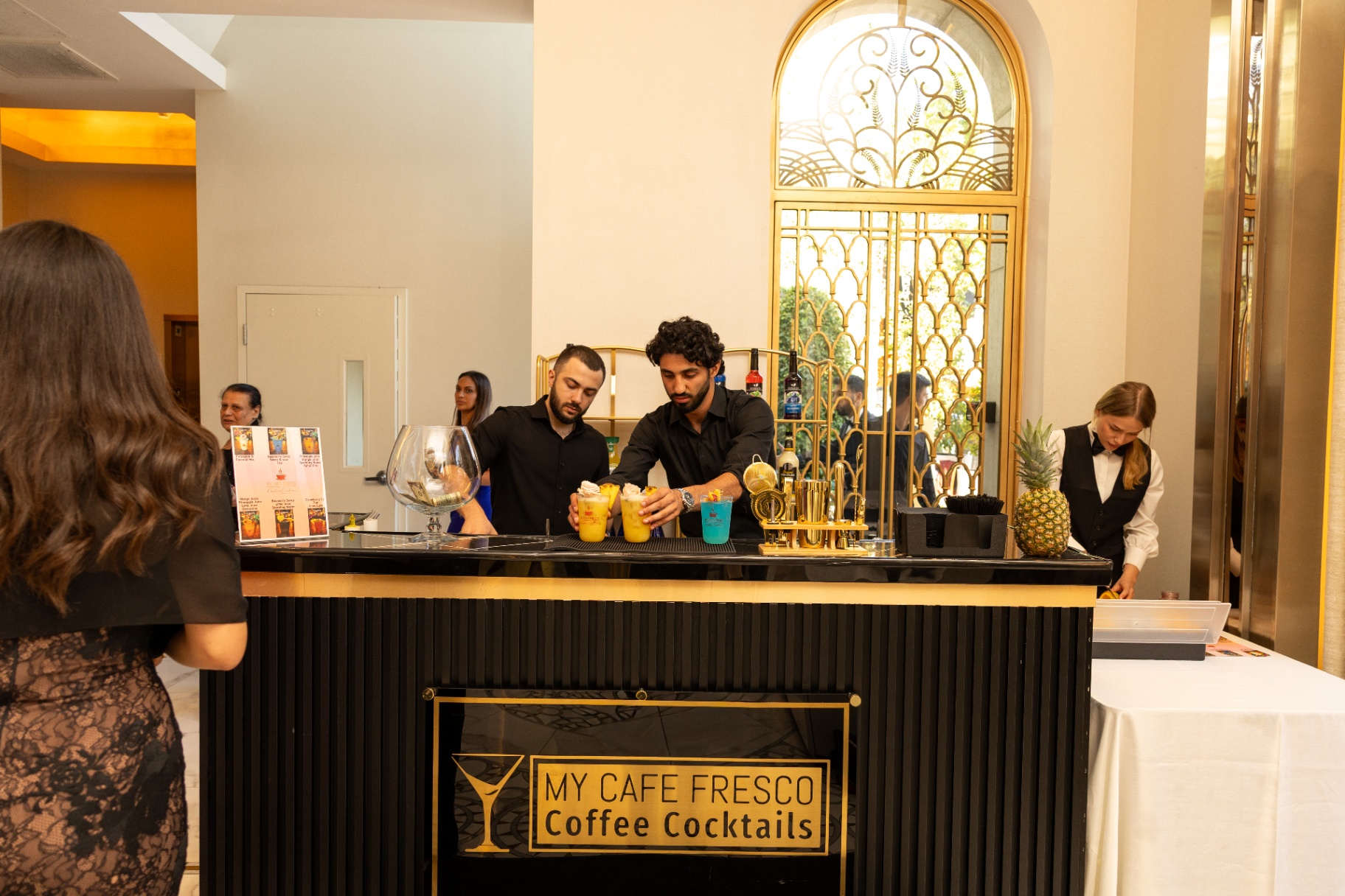 My Cafe Fresco coffee cocktails bar with bartenders serving mocktails at an event