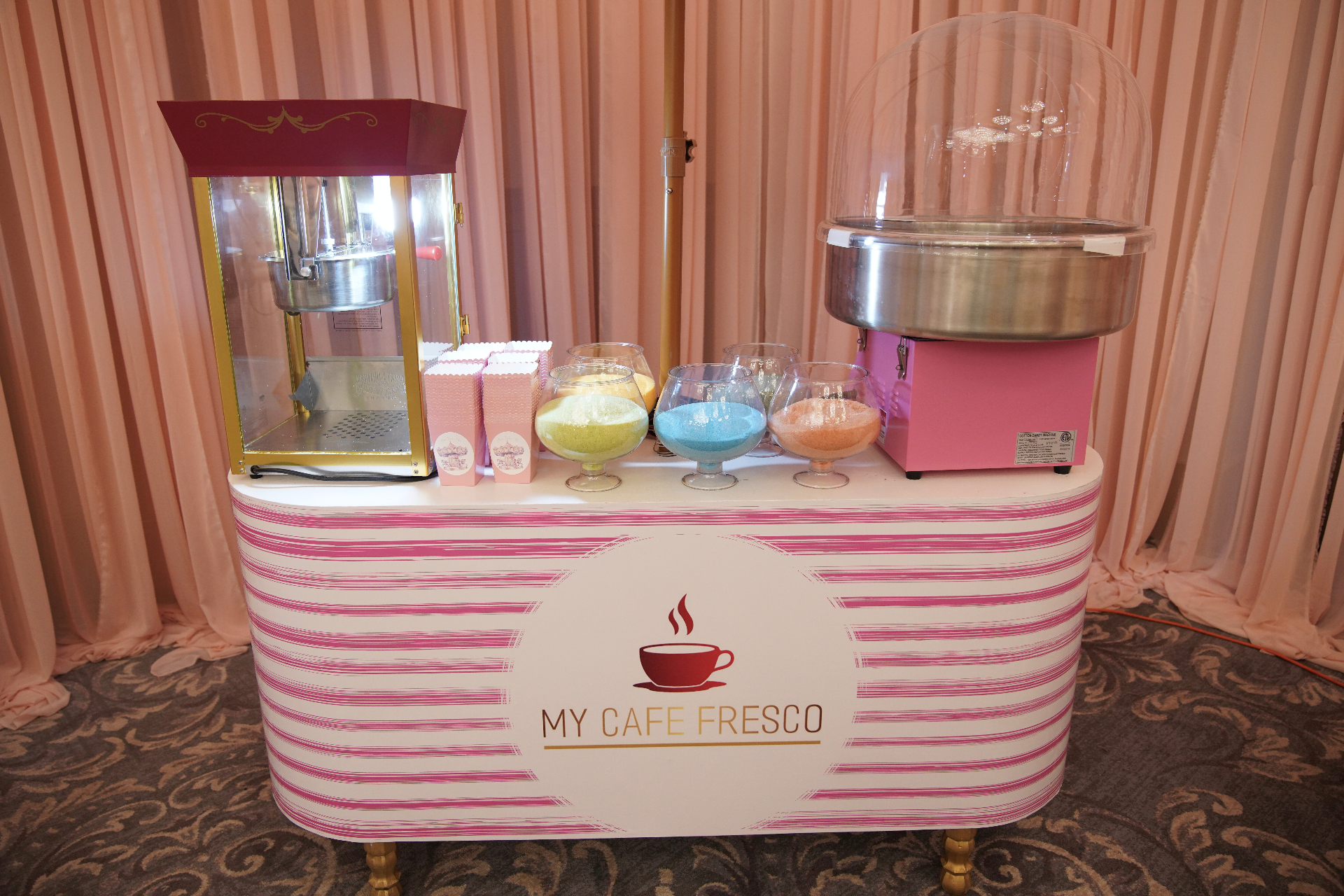My Cafe Fresco cotton candy and popcorn cart with colorful flavor bowls